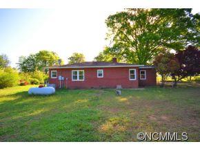 1422 Prince Road Columbus, NC 28722 - Photo 4 of 24 a view of a yard with a house