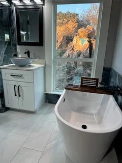 a bathroom with a bathtub