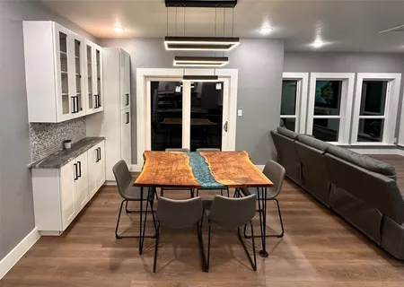 a view of a dining room with furniture
