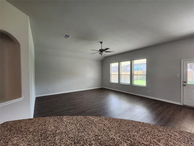 a view of a livingroom with a staircase