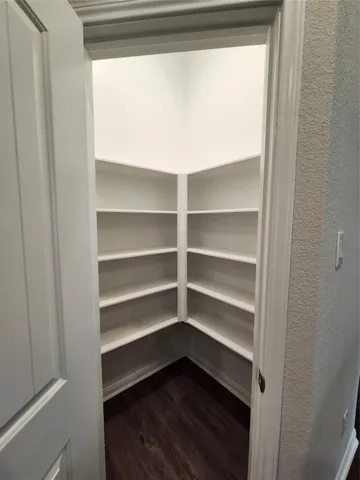 a view of living room with furniture and a flat screen tv