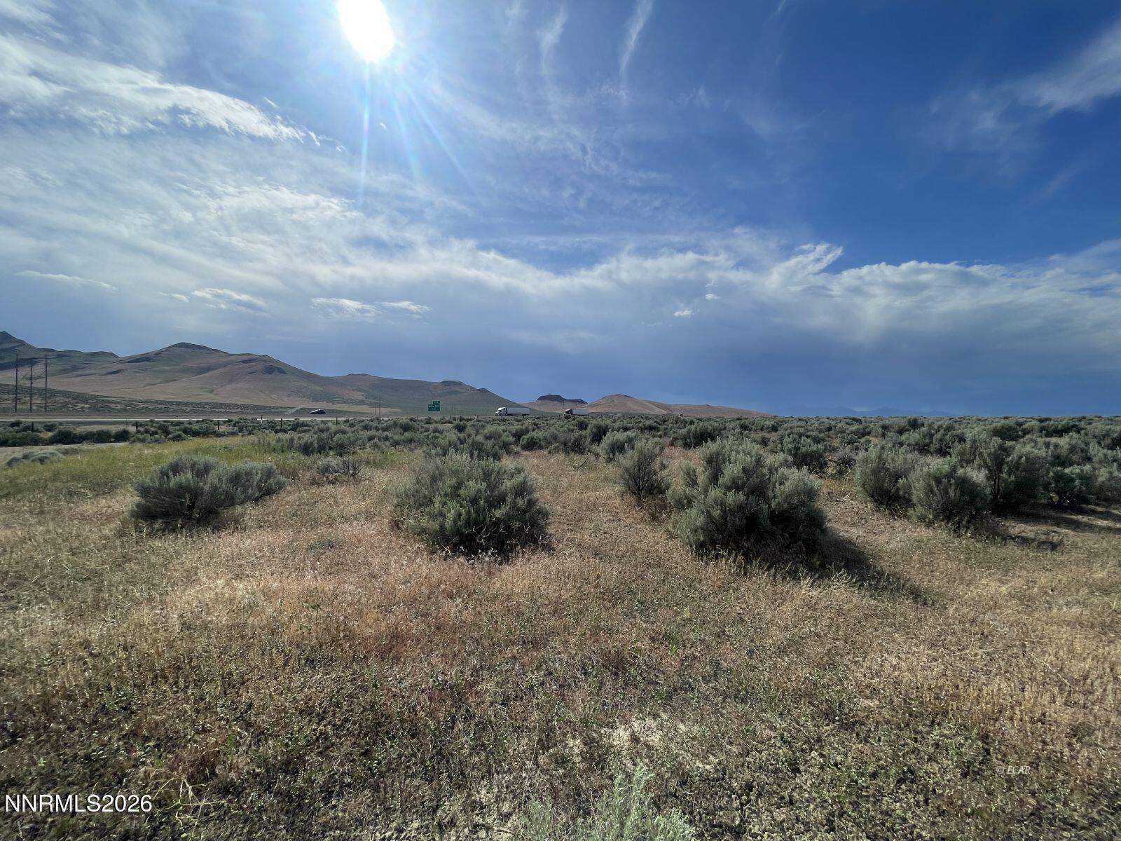 10 Button Point Road Golconda, NV 89414 - Photo 6 of 25 a view of a lake with mountains in the background