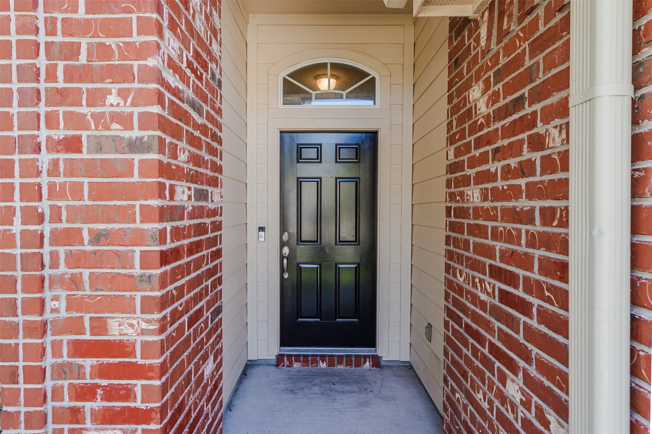 2404 Christoff Loop Austin, TX 78748 - Photo 21 of 24 Doorway to property with brick siding