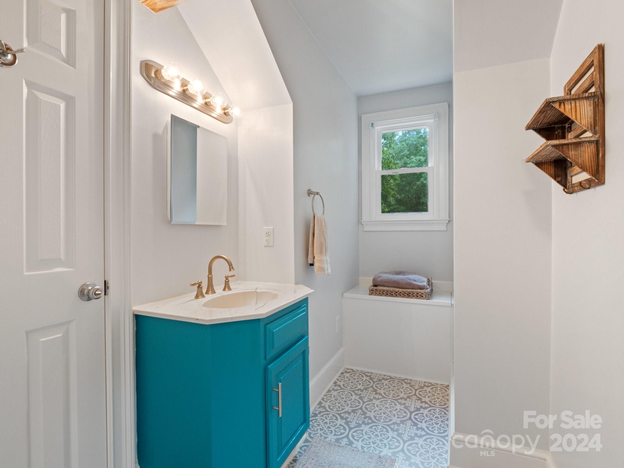 1971 Tara Trail Lancaster, SC 29720 - Photo 32 of 48 a bathroom with a sink and a mirror