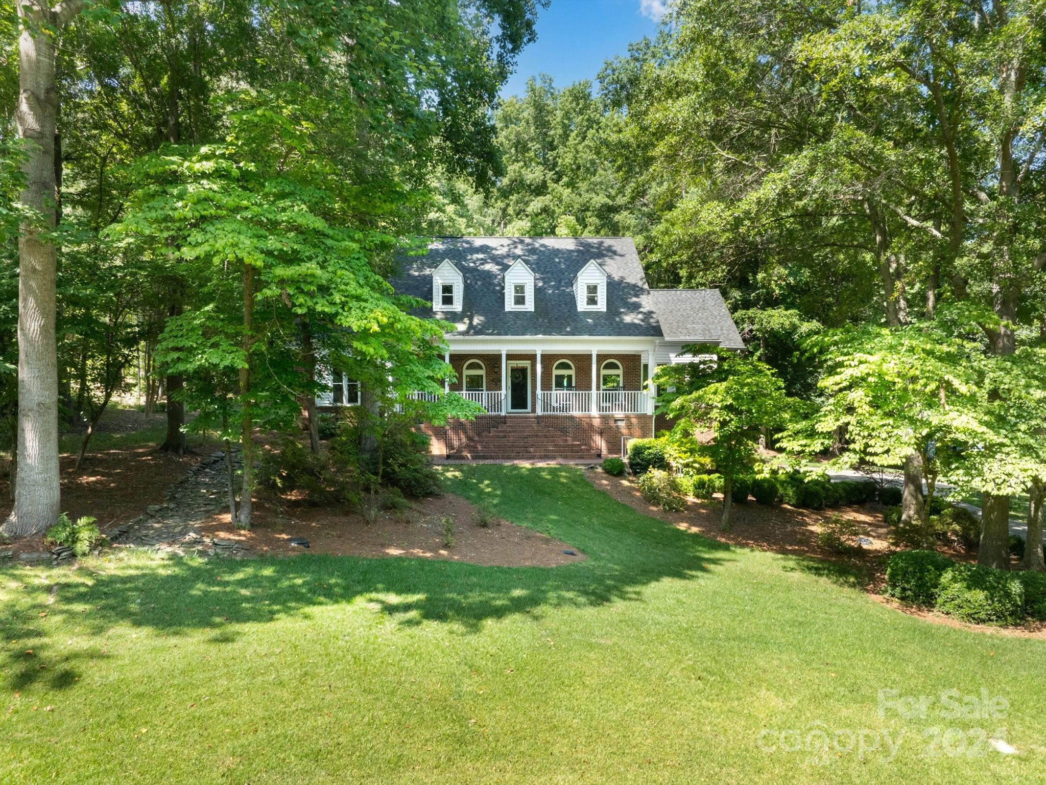 1971 Tara Trail Lancaster, SC 29720 - Photo 4 of 48 a front view of a house with a garden