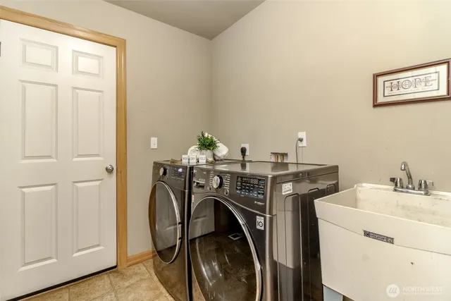 a utility room with dryer and washer