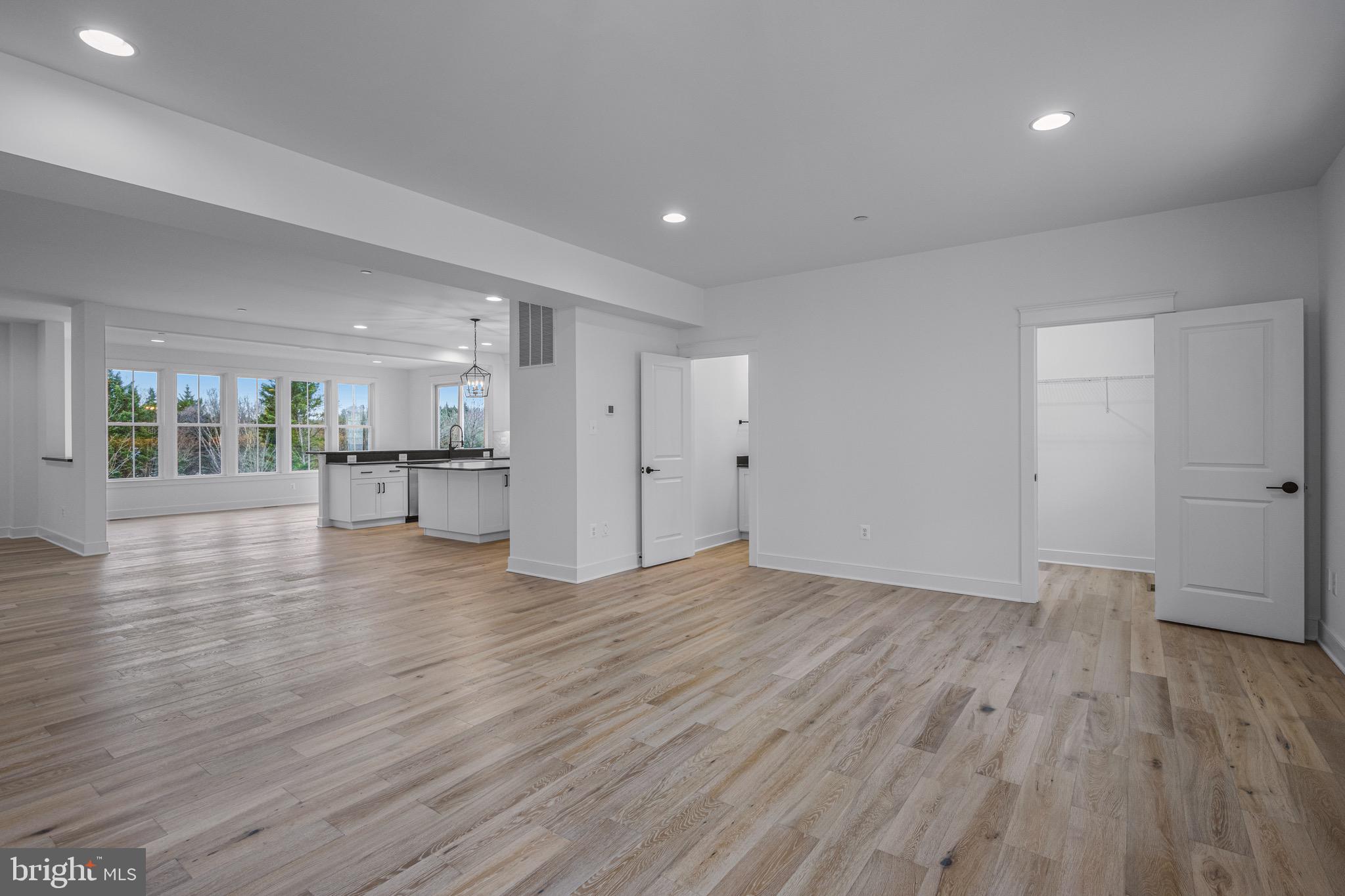 863 Morgan Station Road Woodbine, MD 21797 - Photo 3 of 13 a view of empty room with wooden floor and a window