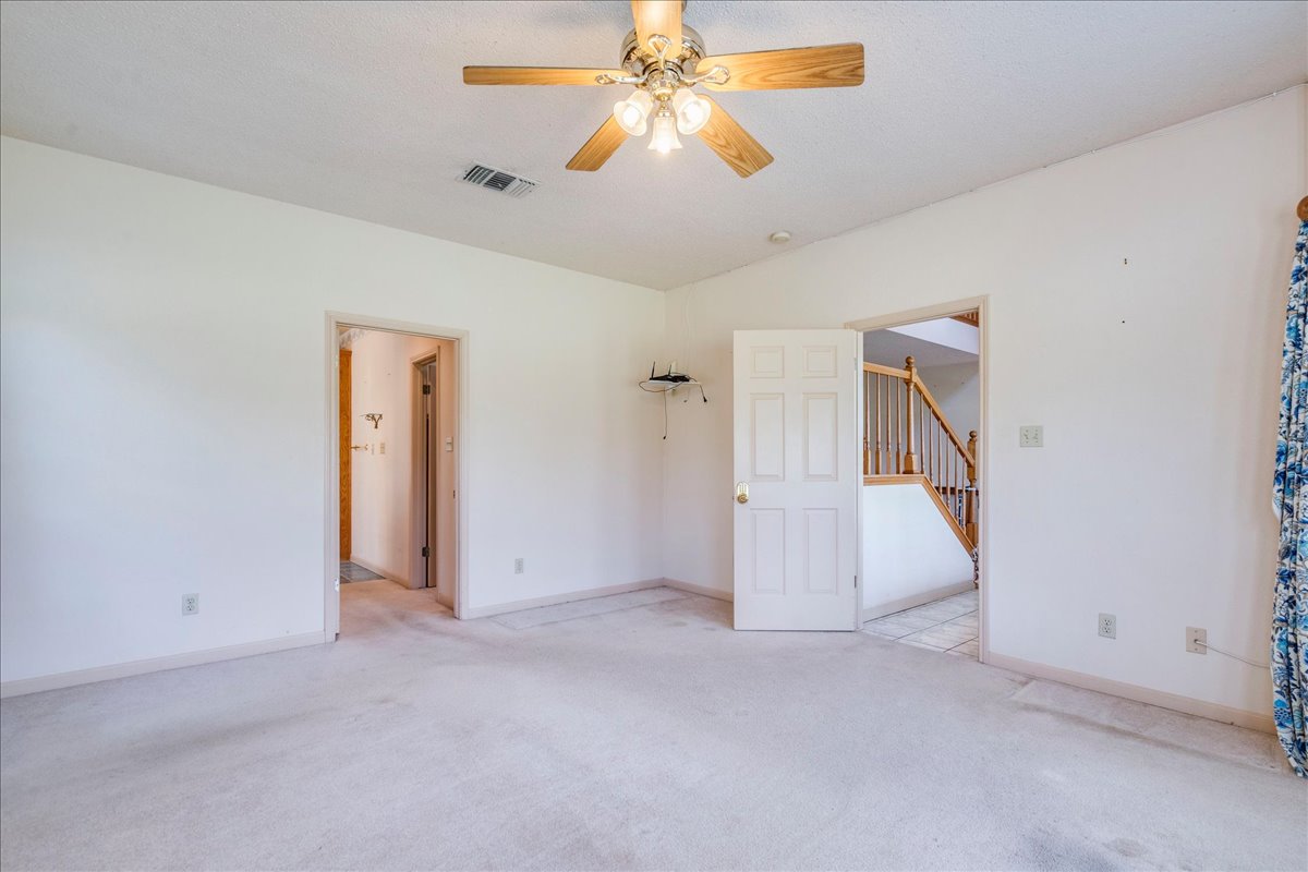 19106 Eyerley Road Manor, TX 78653 - Photo 14 of 40 Primary bedroom on the main level