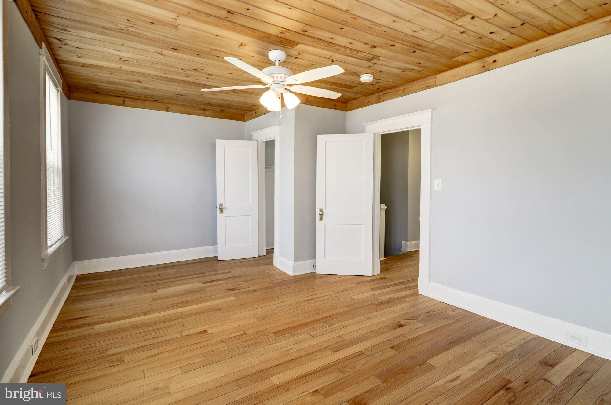 1016 North Rosedale Street Baltimore, MD 21216 - Photo 32 of 58 a view of hallway with wooden floor