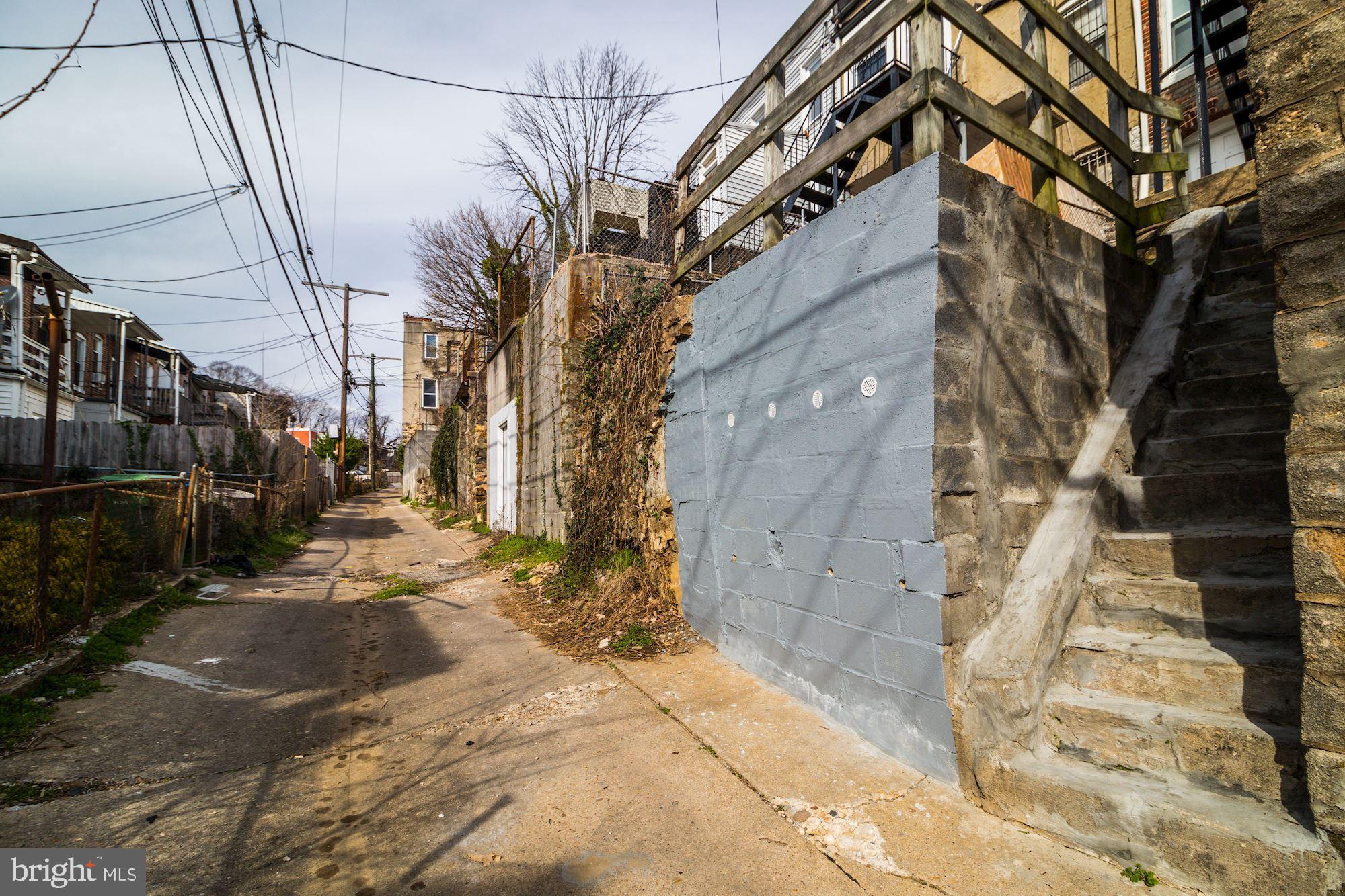 1016 North Rosedale Street Baltimore, MD 21216 - Photo 58 of 58 a view of a pathway of a house with a yard