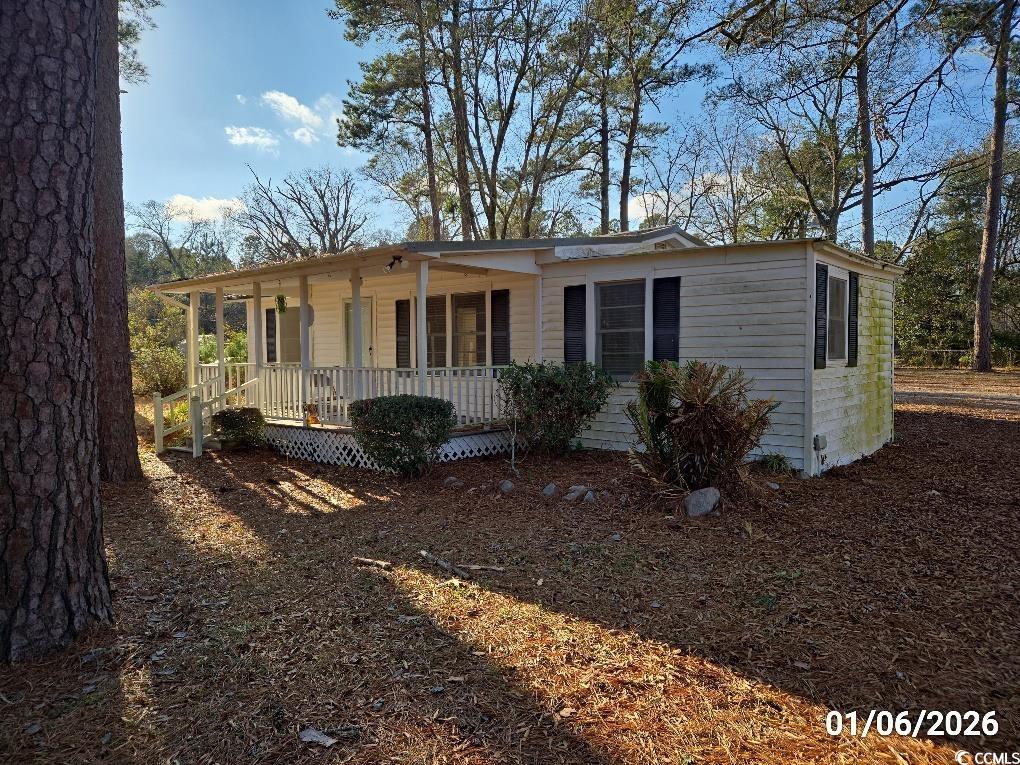 1341 Allison Landing Road Johnsonville, SC 29555 - Photo 11 of 27 View of front facade with covered porch