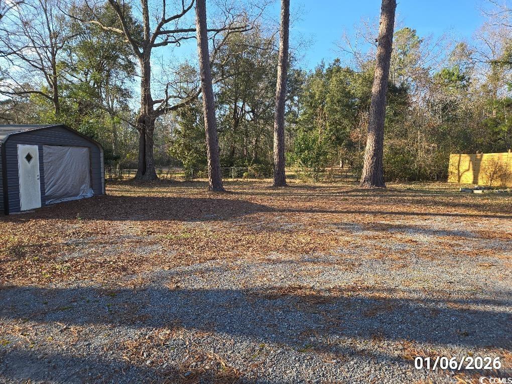 1341 Allison Landing Road Johnsonville, SC 29555 - Photo 17 of 27 View of yard with a storage shed