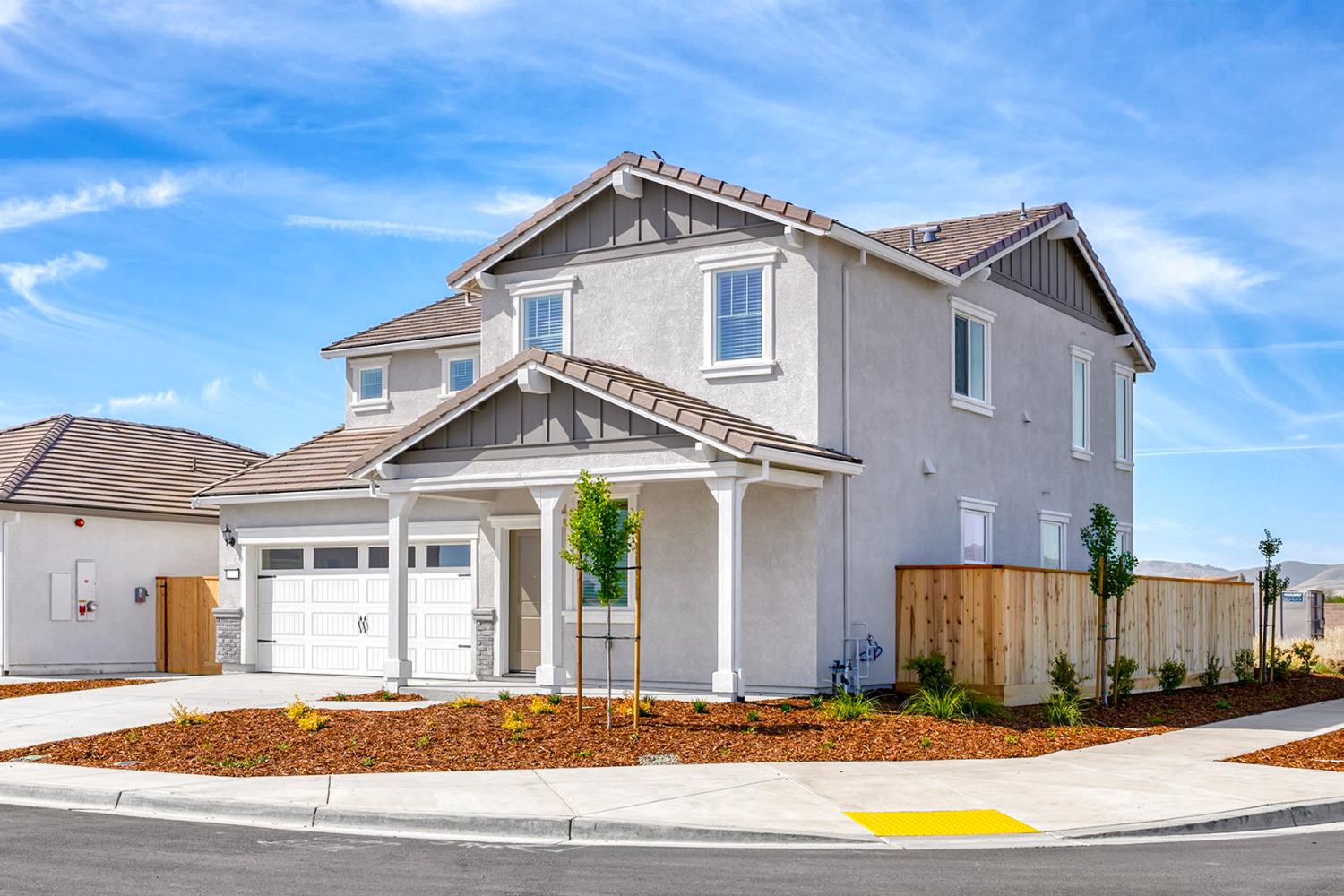 821 Helmsley Lane Patterson, CA 95363 - Photo 2 of 21 a front view of a house with a yard