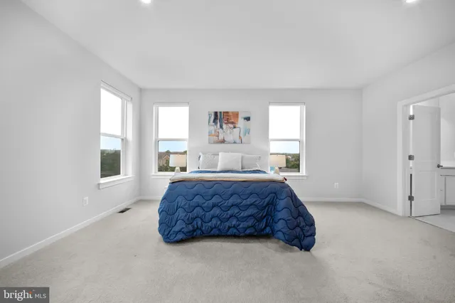 a bathroom with a shower and sink