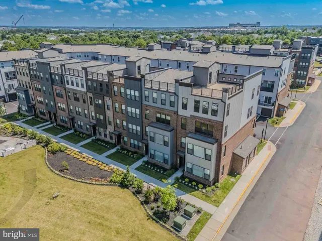 a view of a building with a yard