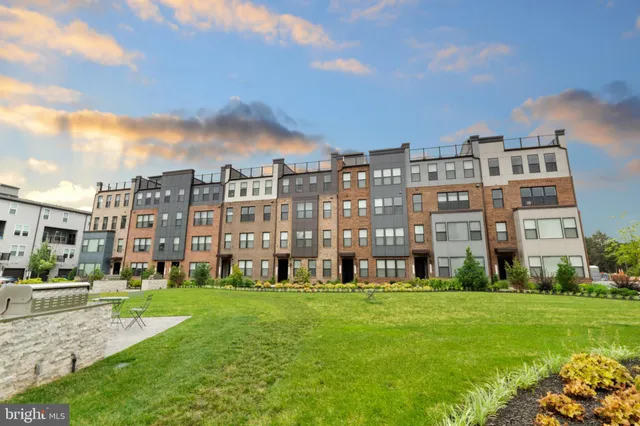 a front view of a building with windows
