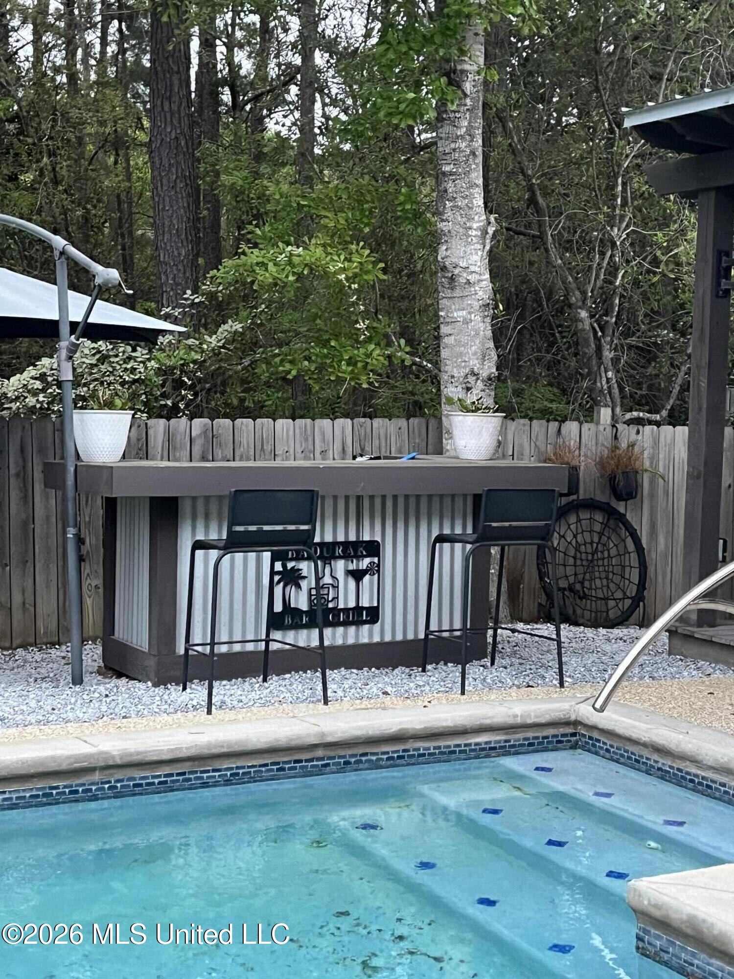 10788 East Taylor Road Gulfport, MS 39503 - Photo 6 of 25 10788 East Taylor Backyard Bar