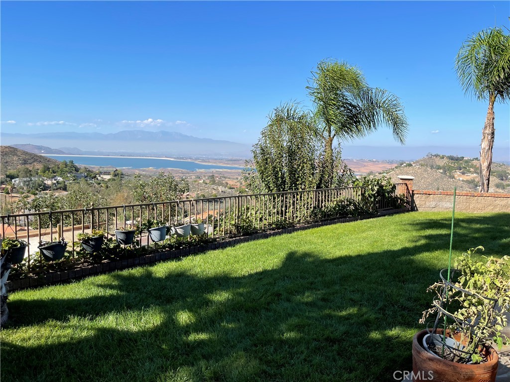 21840 Ridgedale Drive Lake Mathews, CA 92570 - Photo 1 of 1 a view of a golf course with a garden