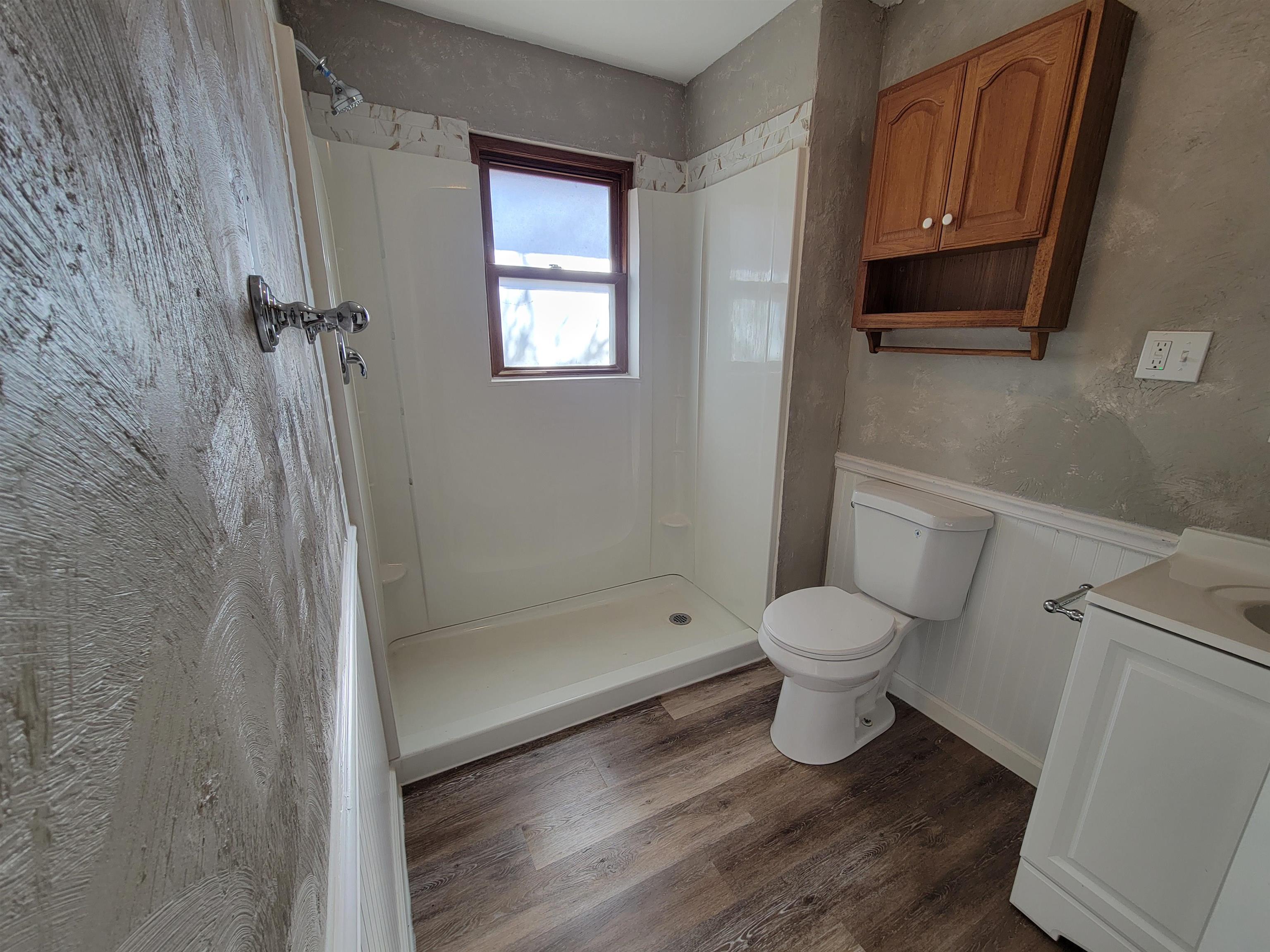 1352 Chartres Street LaSalle, IL 61301 - Photo 4 of 32 a bathroom with a toilet a sink and shower