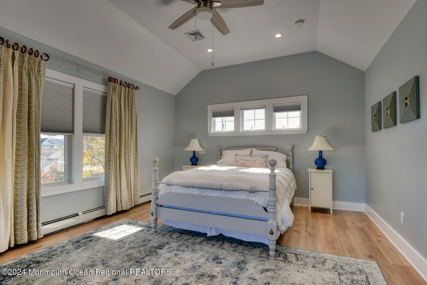 105 St Louis Avenue Point Pleasant Beach, NJ 08742 - Photo 16 of 25 a spacious bedroom with a bed and a window