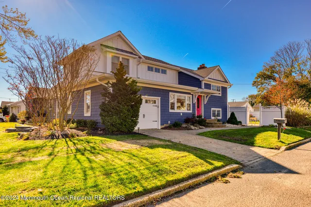 a front view of house with yard