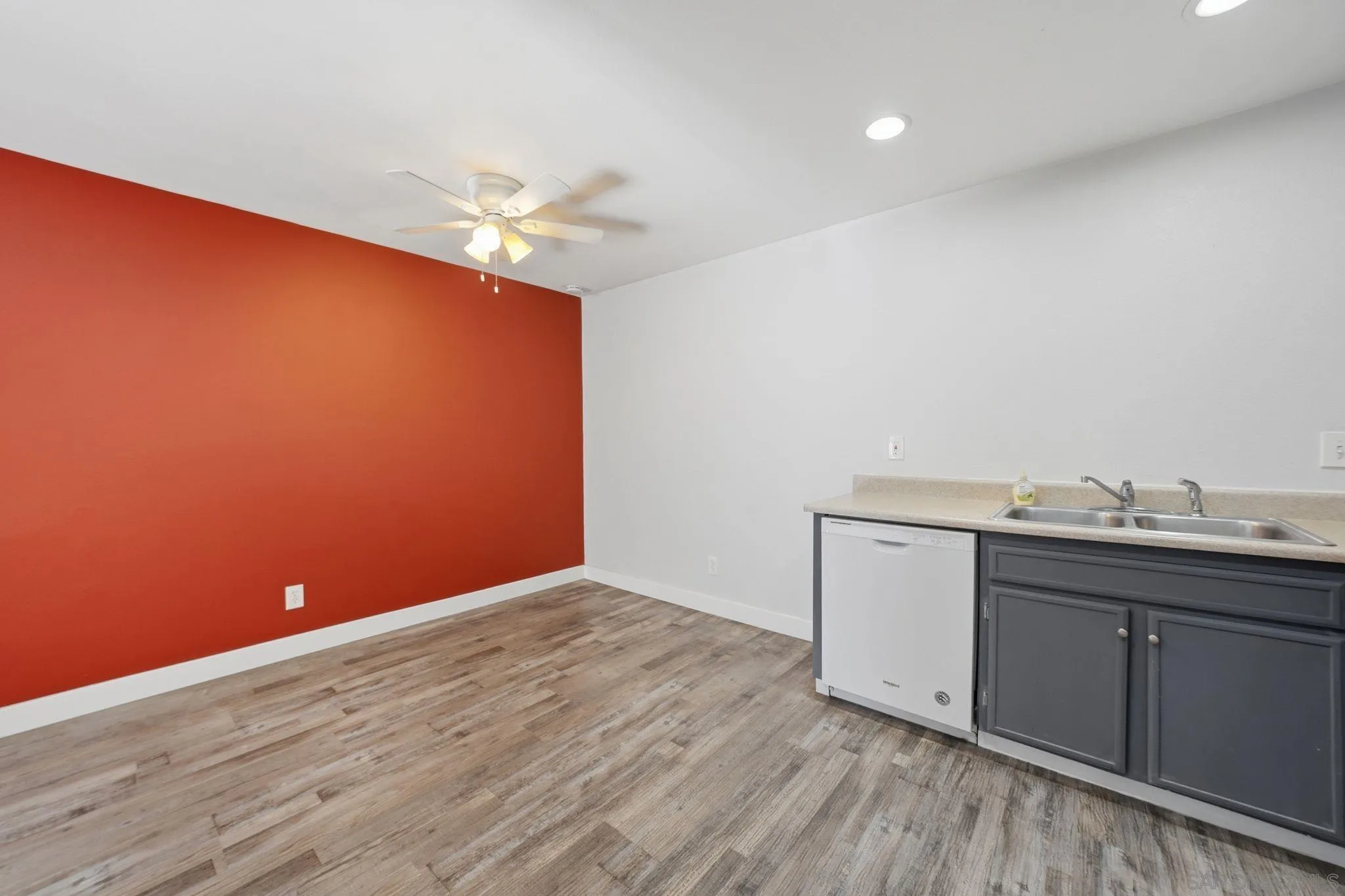 293 Sycamore Road, Unit 15 San Ysidro, CA 92173 - Photo 11 of 25 a view of room with wooden floor and fan