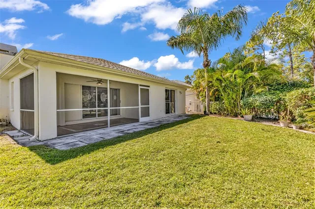 a view of backyard with a garden and yard
