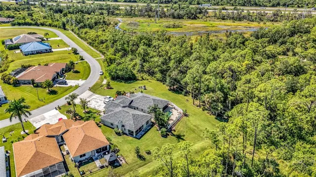 a view of a yard with an outdoor space
