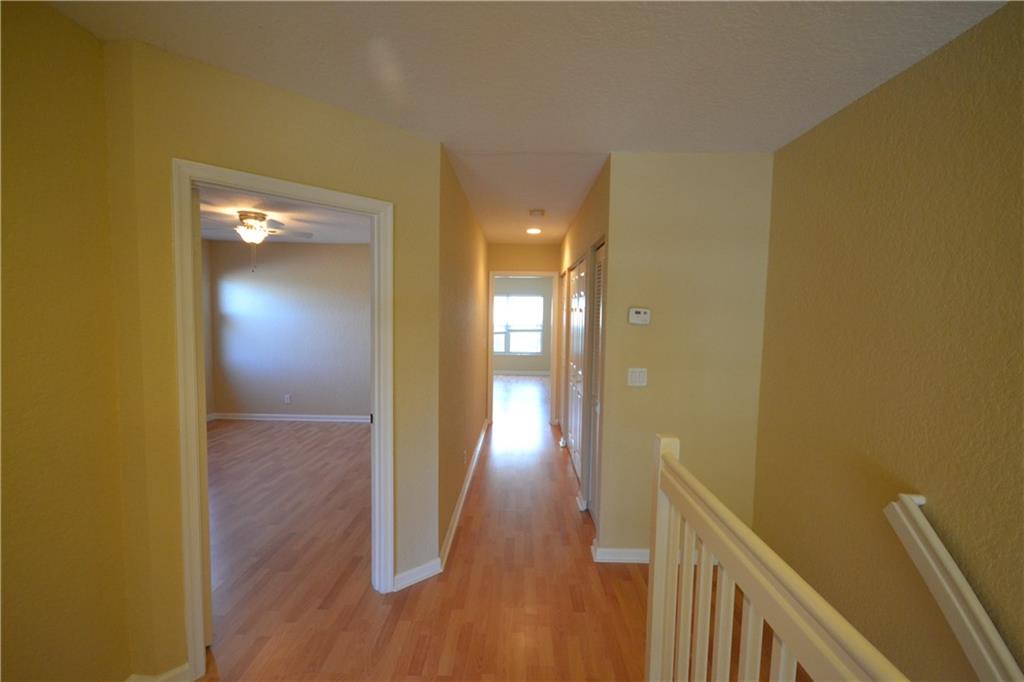 2809 Frederick Boulevard Delray Beach, FL 33483 - Photo 13 of 18 a view of hallway with wooden floor
