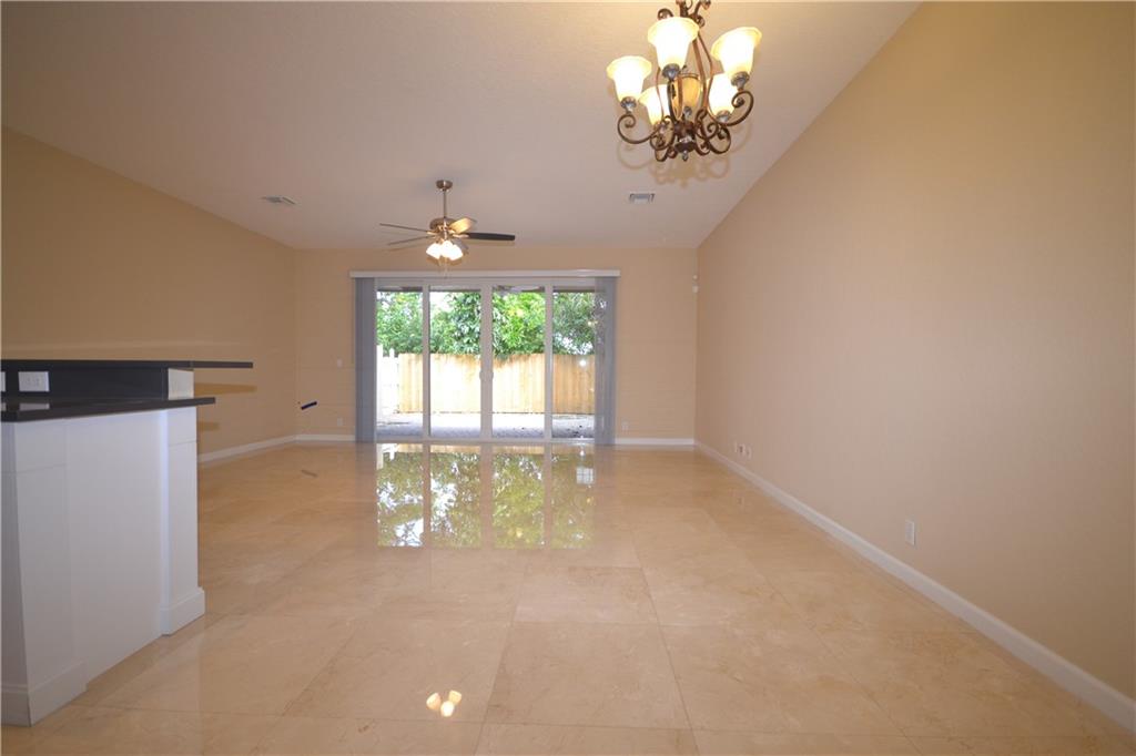 2809 Frederick Boulevard Delray Beach, FL 33483 - Photo 4 of 18 a view of an empty room with a window