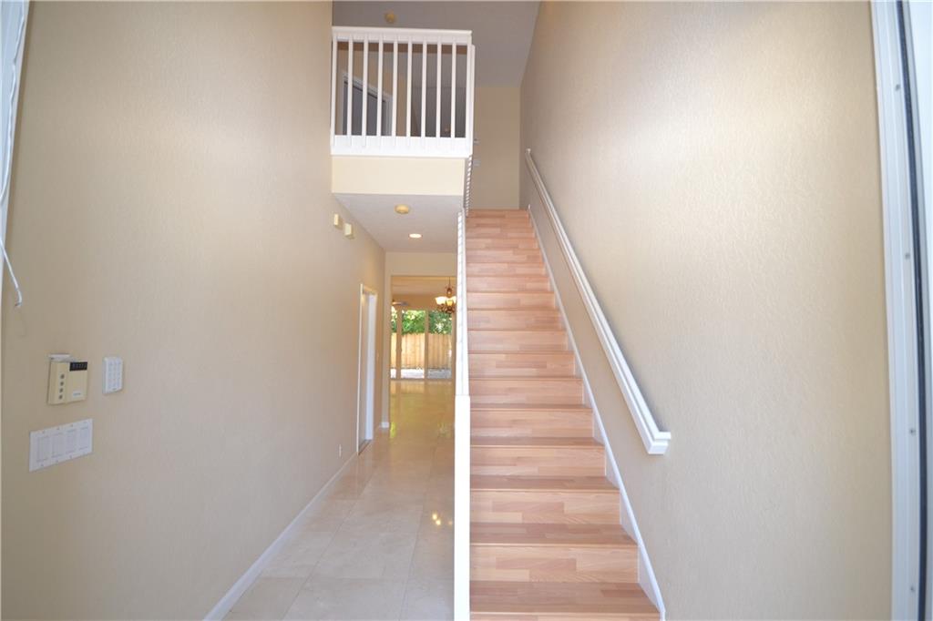 2809 Frederick Boulevard Delray Beach, FL 33483 - Photo 9 of 18 a view of a hallway with wooden floor and entryway