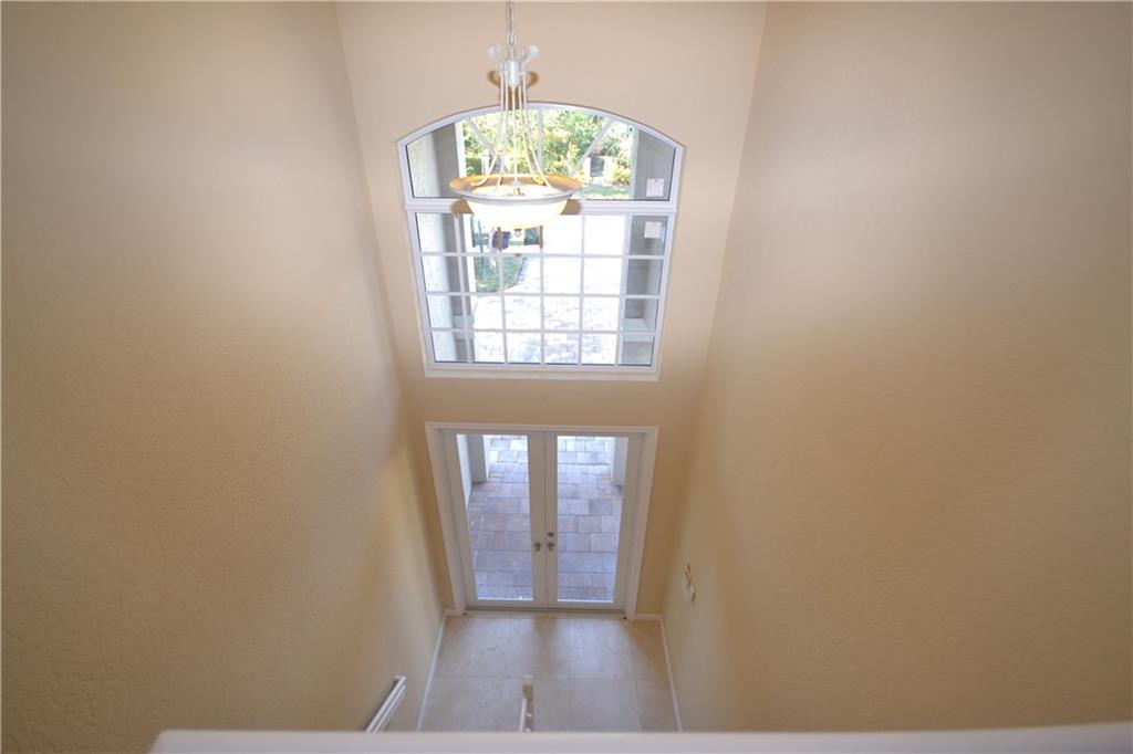 2809 Frederick Boulevard Delray Beach, FL 33483 - Photo 10 of 18 an empty room with windows and mountain view