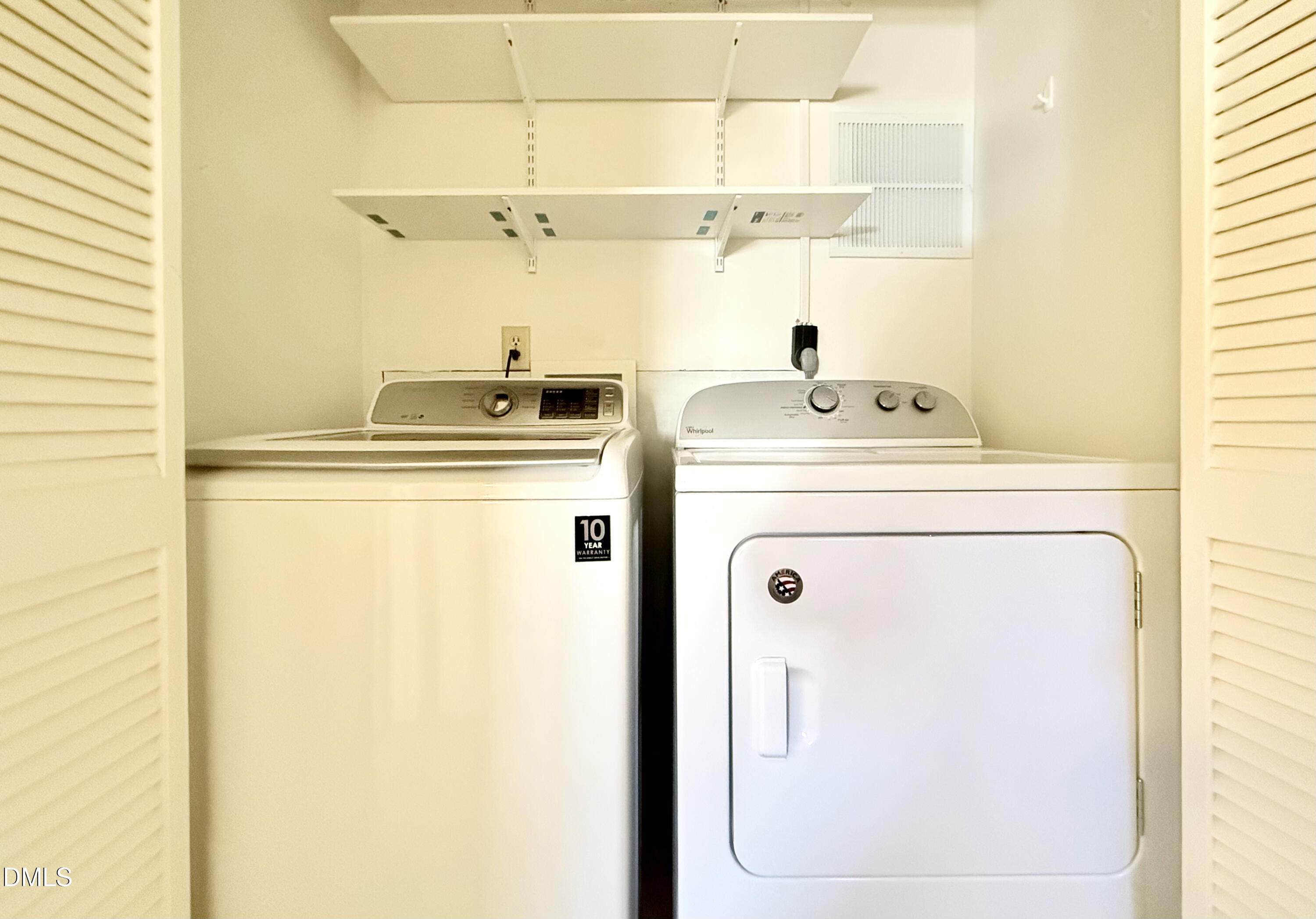 702 Delmar Road Cary, NC 27511 - Photo 14 of 23 a utility room with dryer and washer