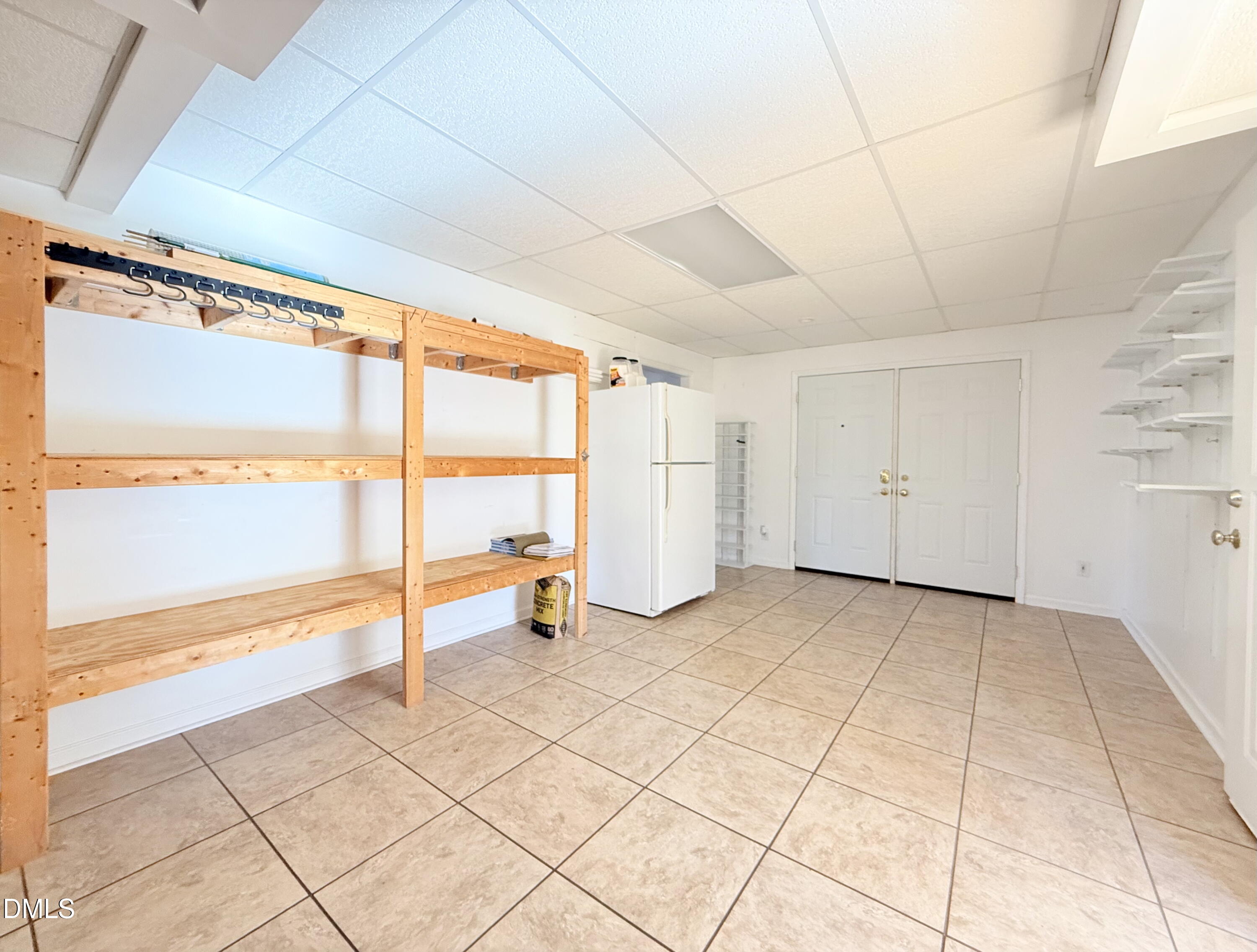 702 Delmar Road Cary, NC 27511 - Photo 18 of 23 a view of an empty room with a window