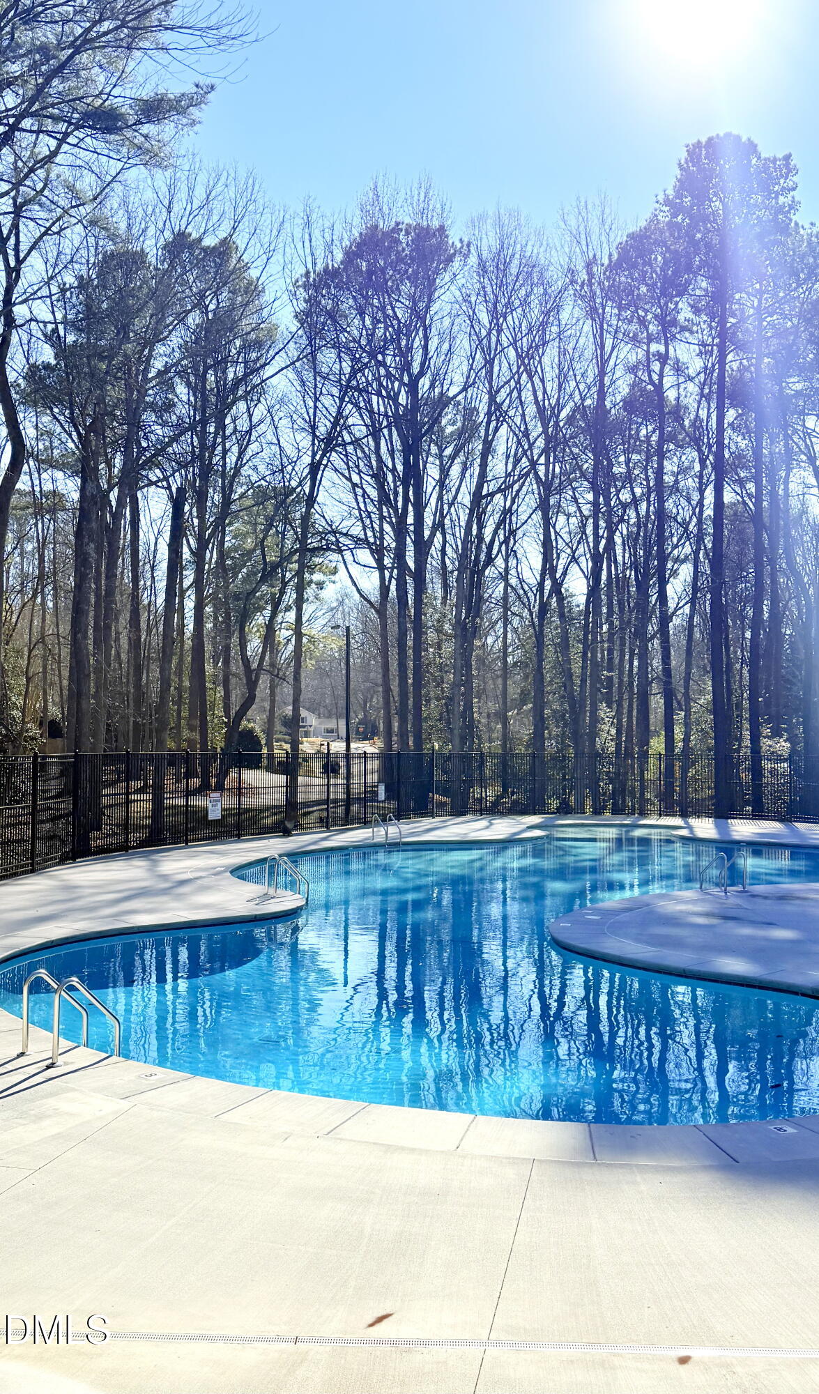 702 Delmar Road Cary, NC 27511 - Photo 23 of 23 a view of backyard with swimming pool and outdoor seating
