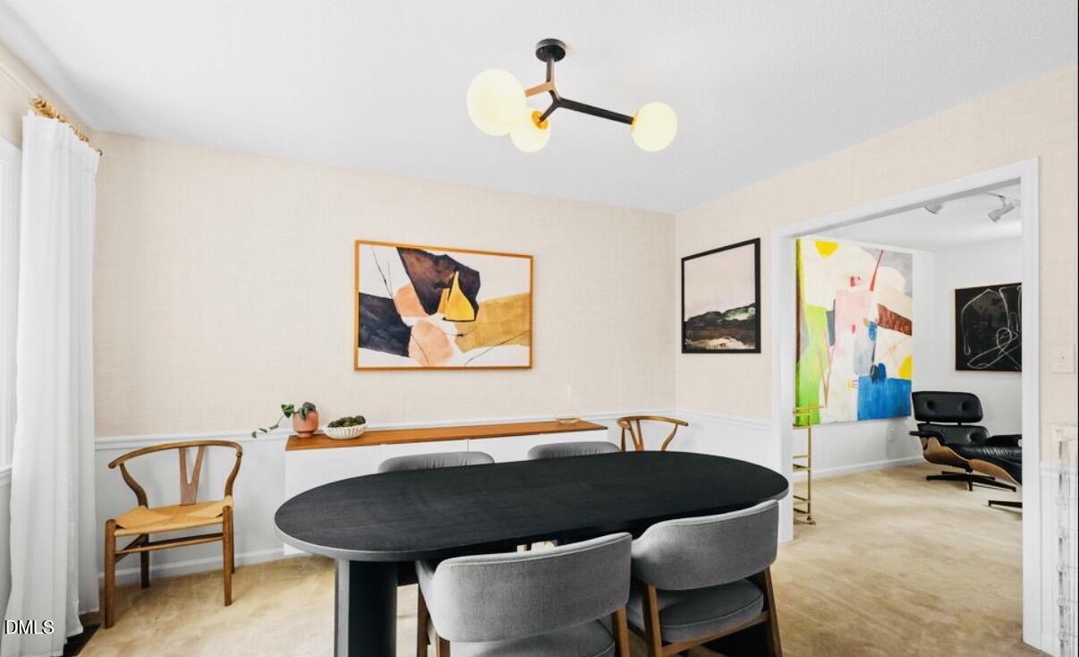 702 Delmar Road Cary, NC 27511 - Photo 6 of 23 a living room with furniture and a piano