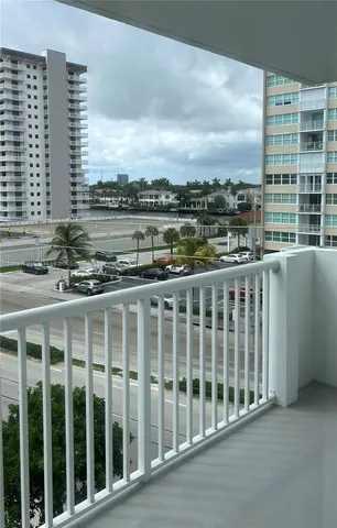 a view of a balcony with city view