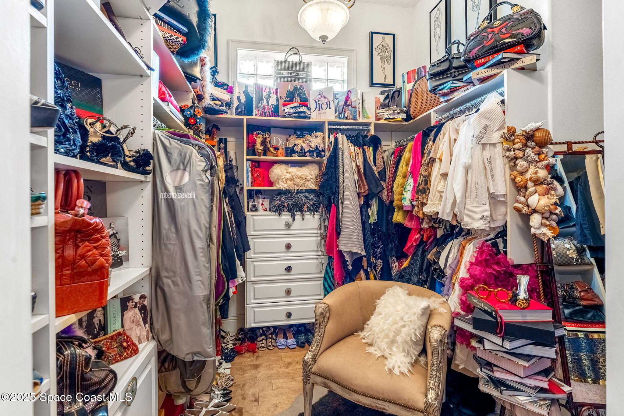 3738 Cappio Drive Melbourne, FL 32940 - Photo 22 of 62 a view of walk in closet with clothes