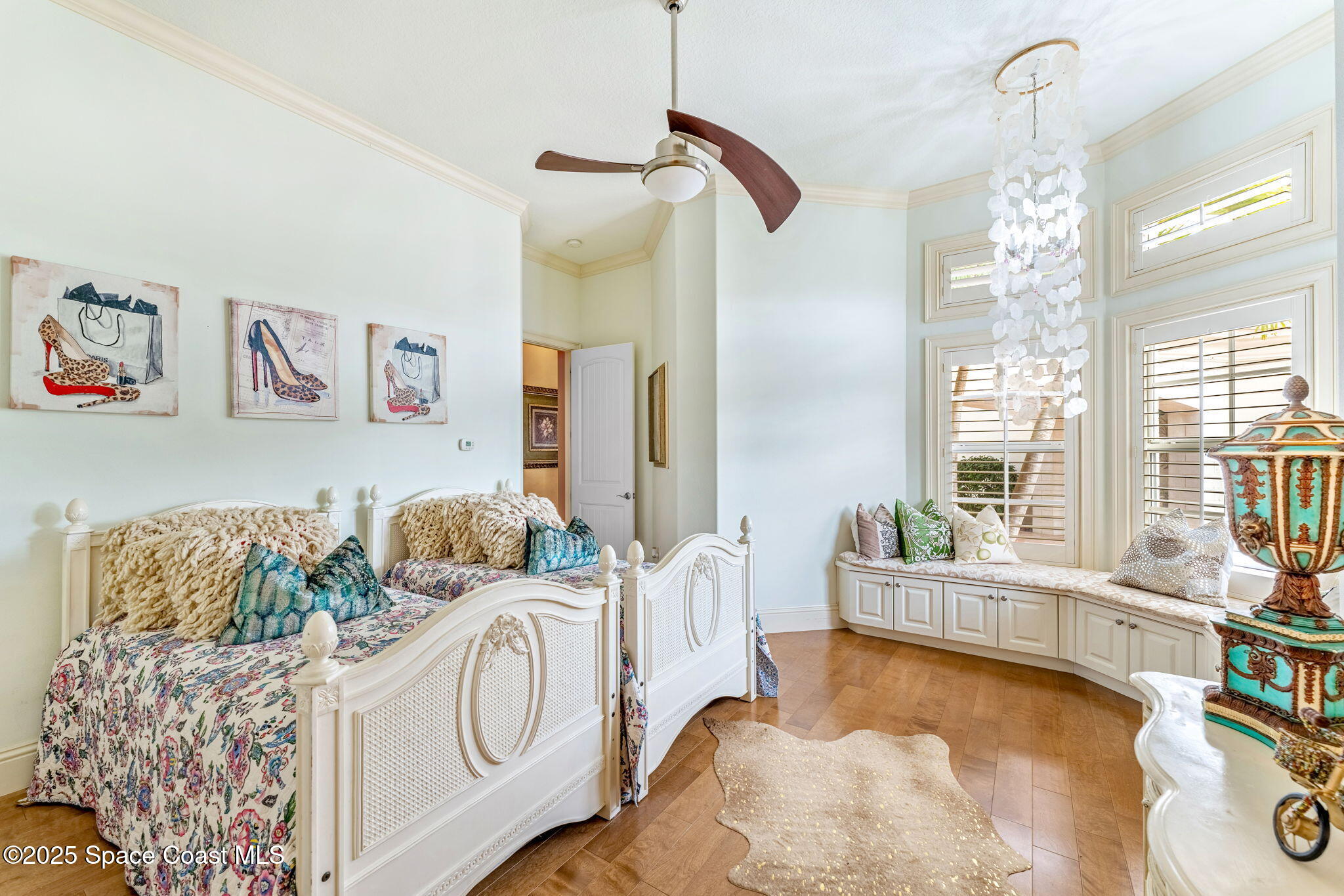 3738 Cappio Drive Melbourne, FL 32940 - Photo 24 of 62 a living room with furniture and a large window