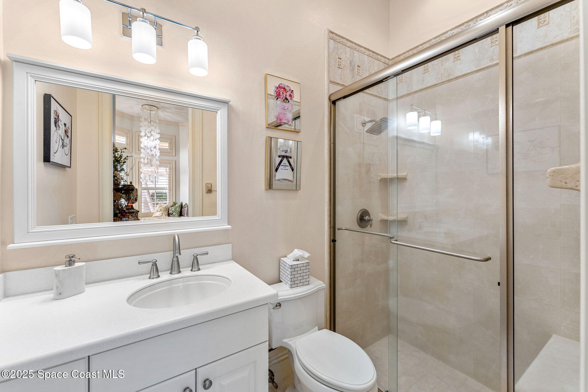 3738 Cappio Drive Melbourne, FL 32940 - Photo 28 of 62 a bathroom with a sink toilet and shower