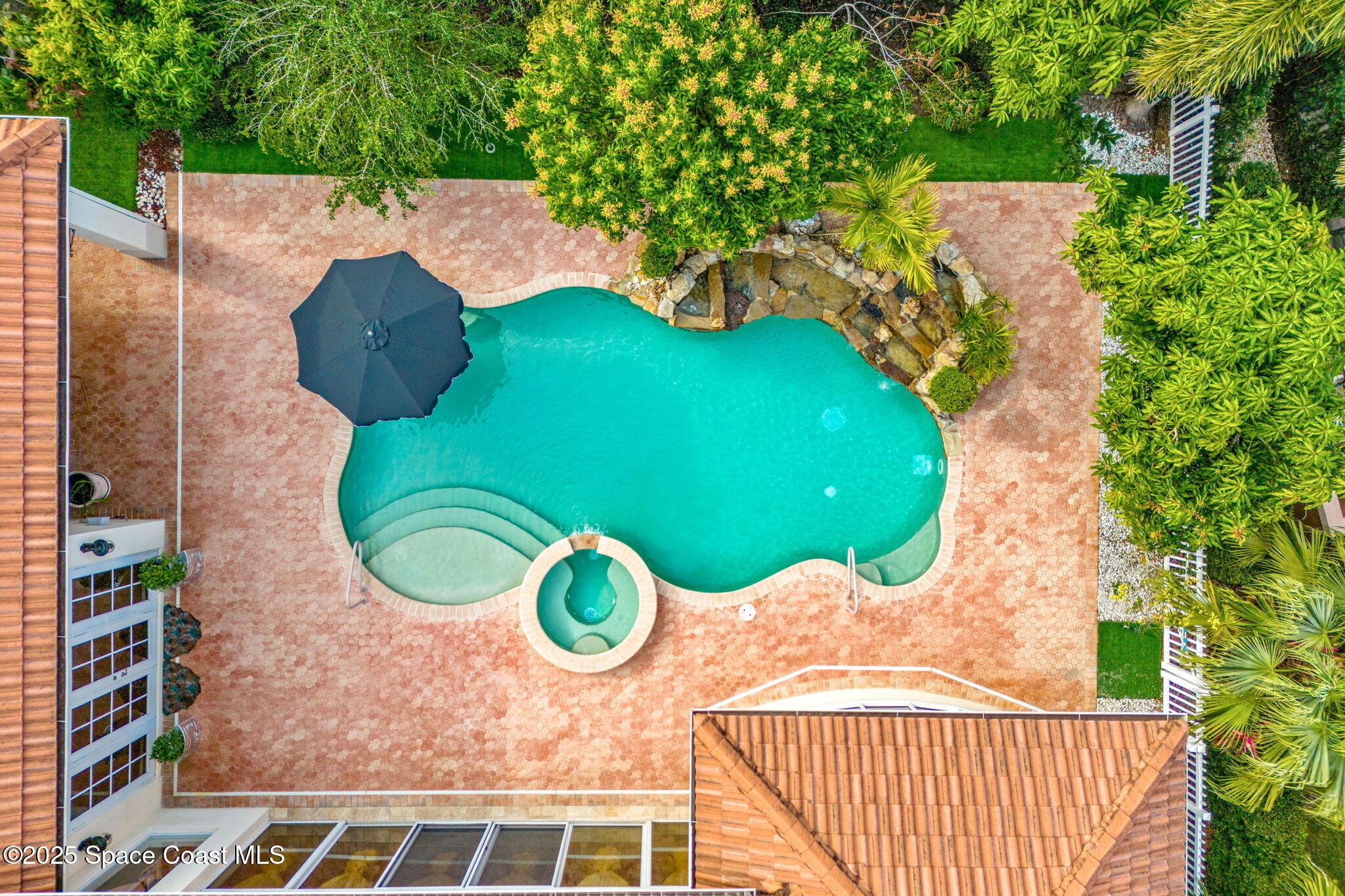 3738 Cappio Drive Melbourne, FL 32940 - Photo 52 of 62 an aerial view of a house