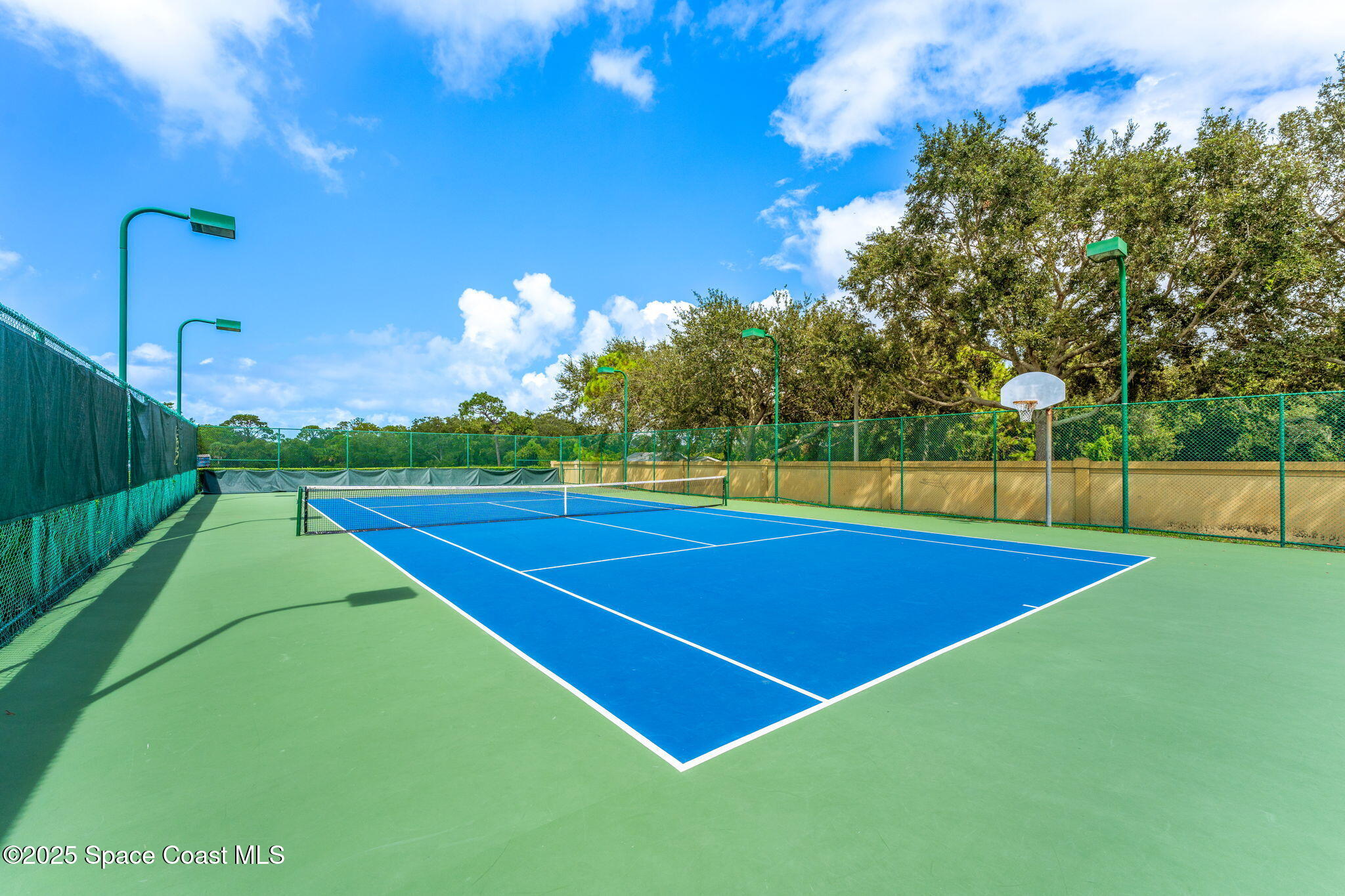 3738 Cappio Drive Melbourne, FL 32940 - Photo 58 of 62 a view of a tennis court