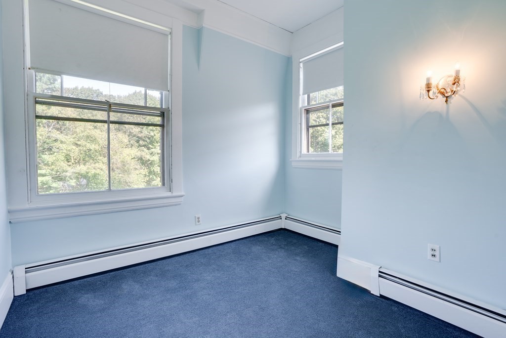 156 Chestnut Street, Unit 6 North Andover, MA 01845 - Photo 16 of 27 an empty room with a window