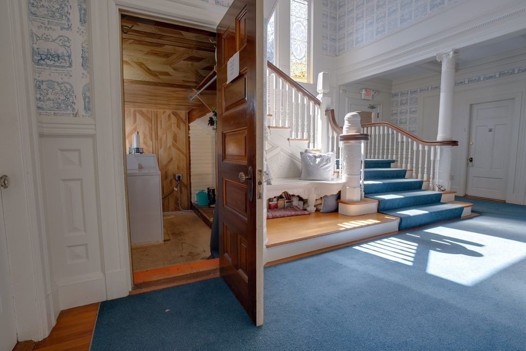 156 Chestnut Street, Unit 6 North Andover, MA 01845 - Photo 23 of 27 a view of livingroom with furniture and stairs