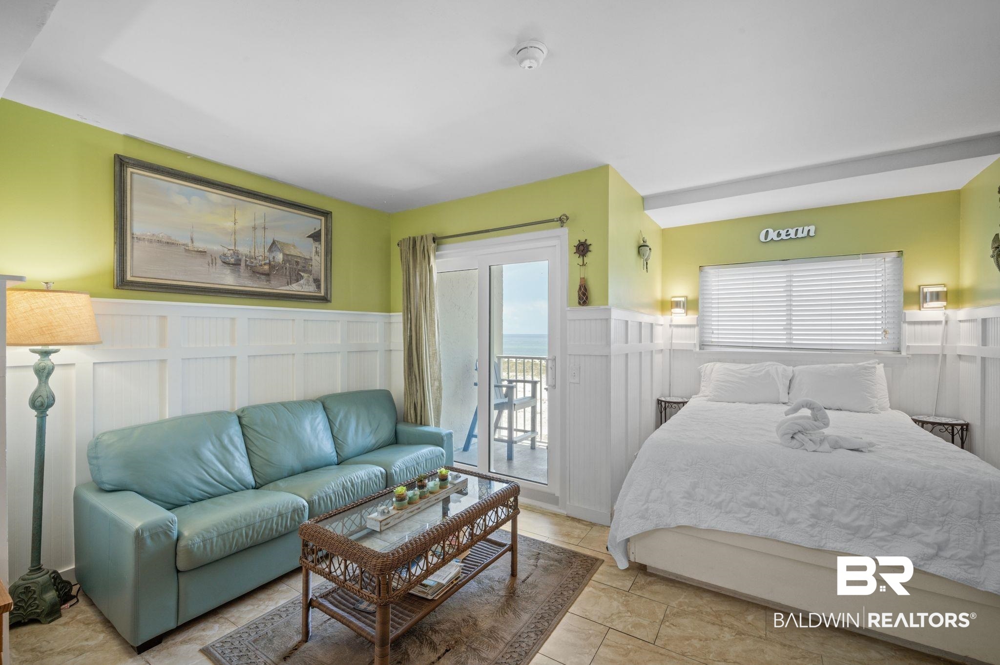 375 Plantation Road, Unit 5304 Gulf Shores, AL 36542 - Photo 9 of 42 Bedroom with a decorative wall, access to exterior, and a wainscoted wall