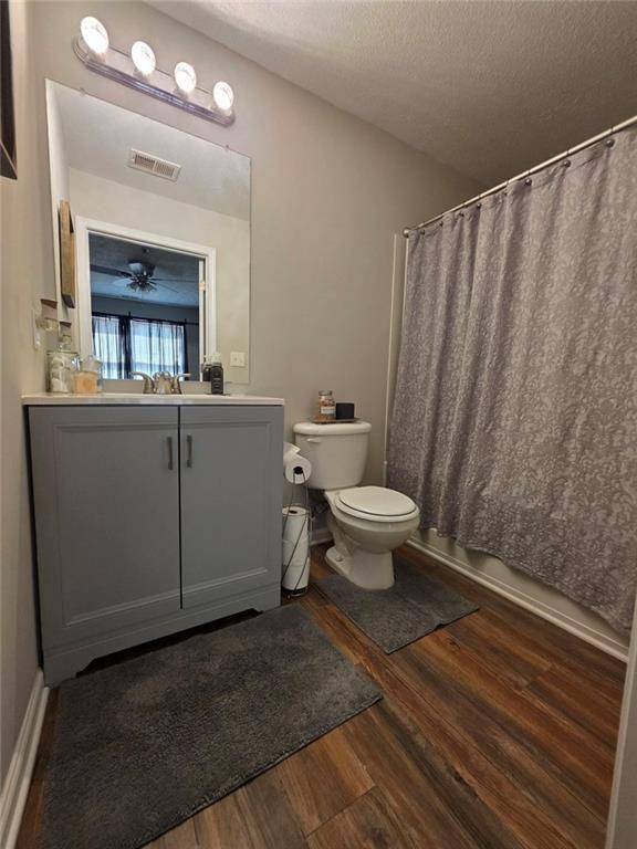 6102 Fairington Ridge Circle Lithonia, GA 30038 - Photo 13 of 22 a bathroom with a toilet sink and mirror