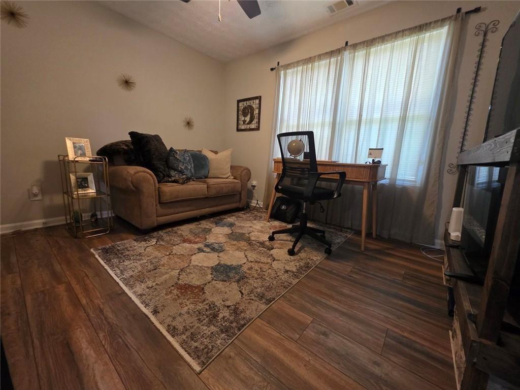 6102 Fairington Ridge Circle Lithonia, GA 30038 - Photo 17 of 22 a living room with furniture and a window