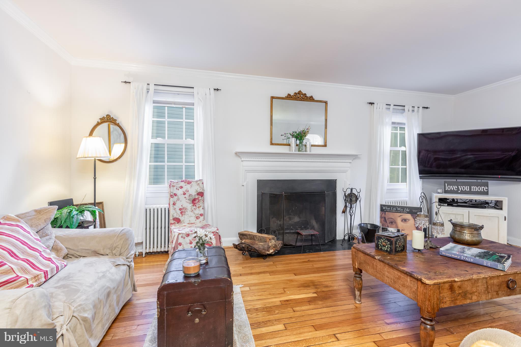 5507 Greentree Road Bethesda, MD 20817 - Photo 6 of 30 Spacious Living Room with Woodburning Fireplace