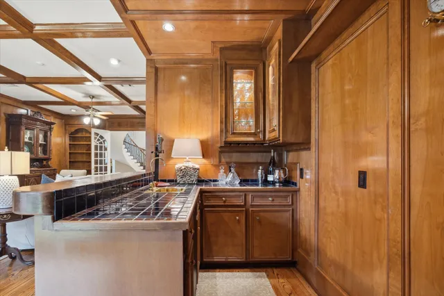 a kitchen with a sink and cabinets