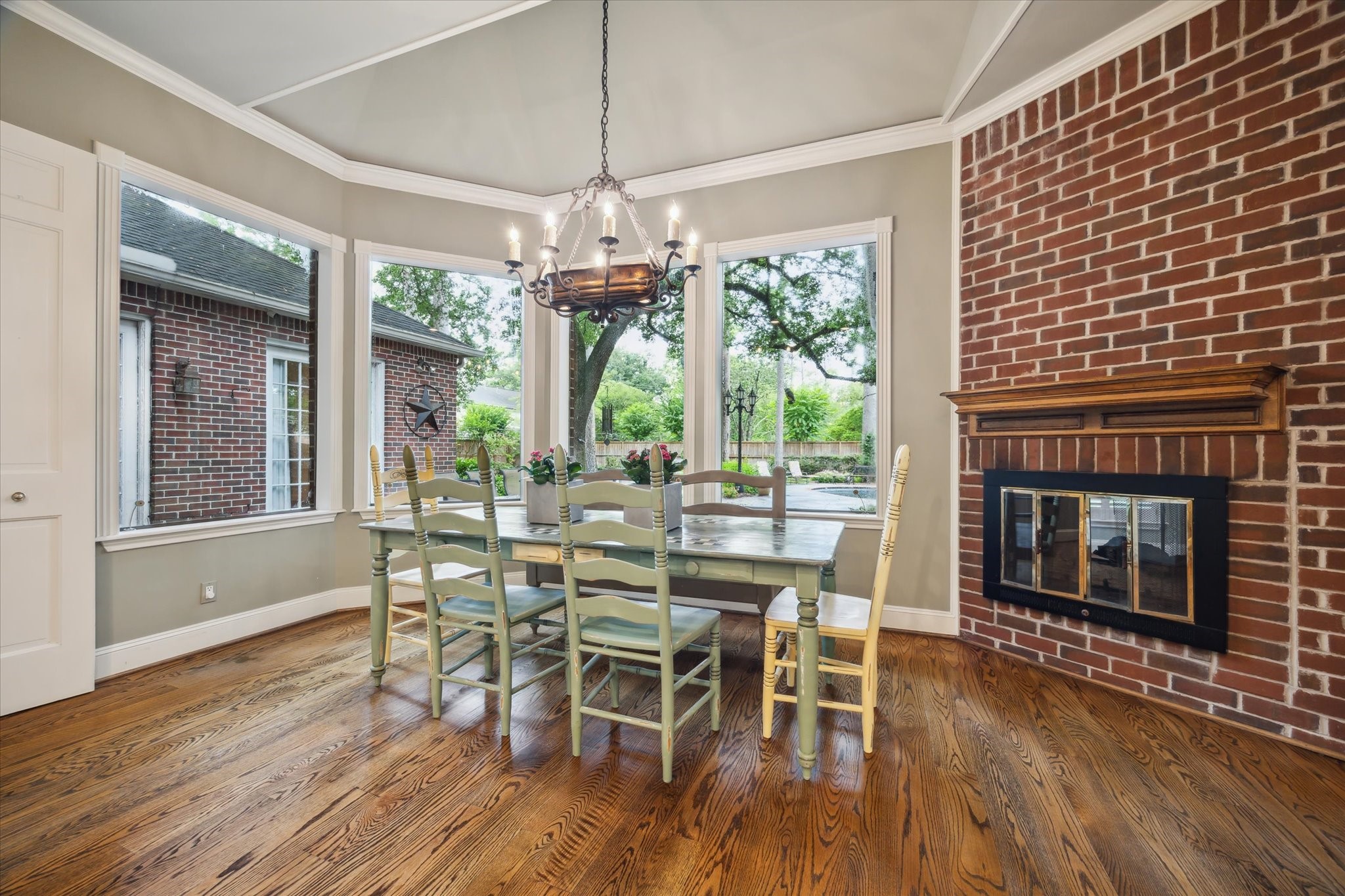 345 Knipp Road Bunker Hill Village, TX 77024 - Photo 17 of 42 Breakfast Room with brick fireplace